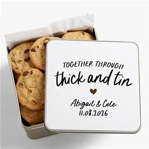 A personalized metal gift tin made for a 10th wedding anniversary